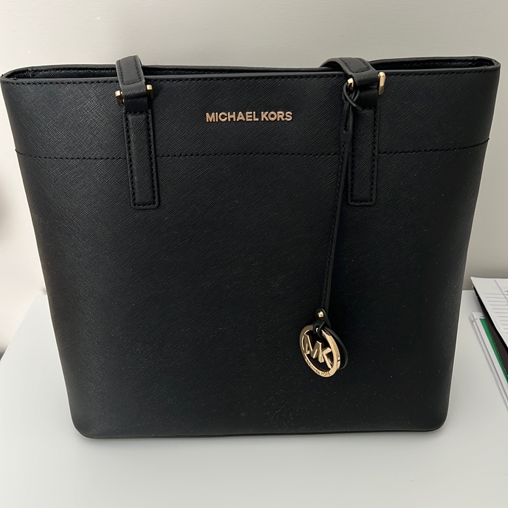 SOLD ….. Michael Kors Serafina black pebble leather purse